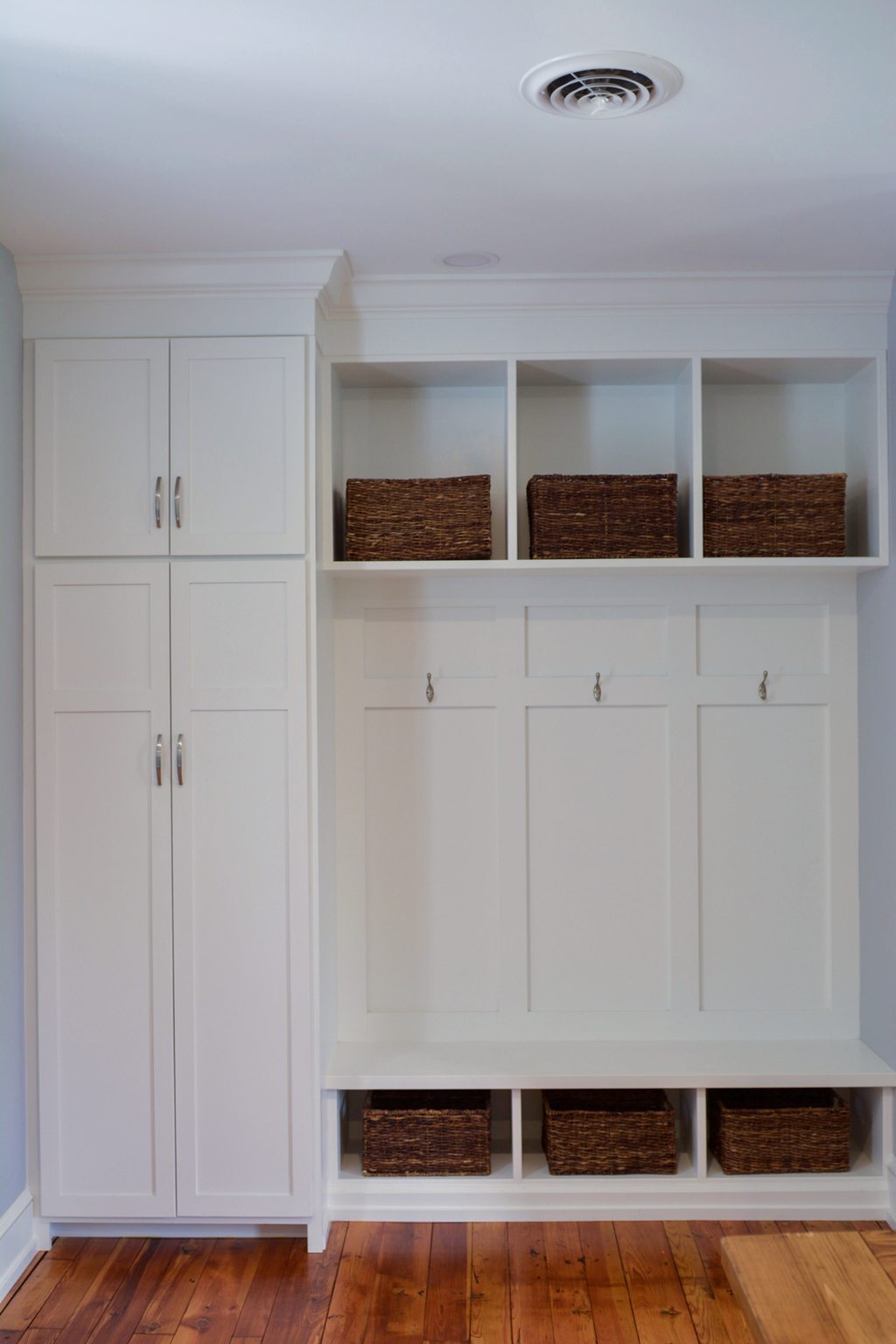 Entryway Cabinetry with Open Box Shelves and Hangers