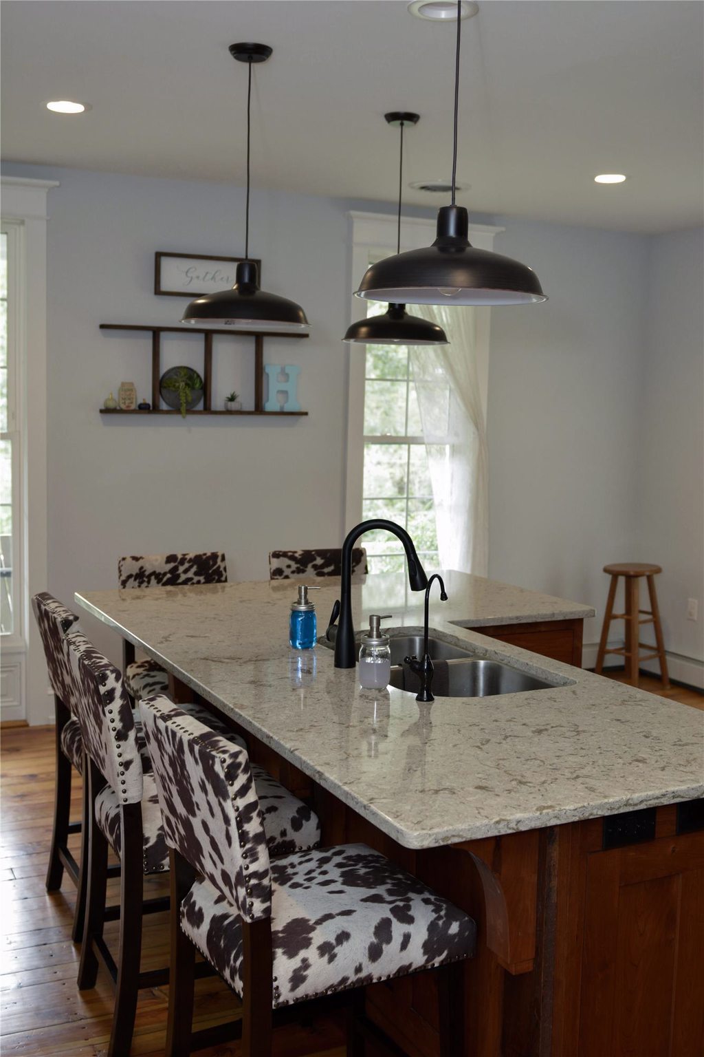 Kitchen Island with Deep Sink and Hanging Lights